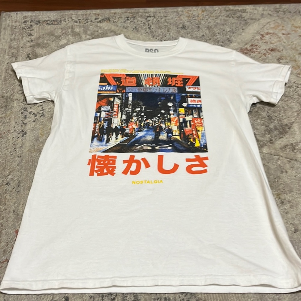 T-shirt for all to wear. Gently used looks good.